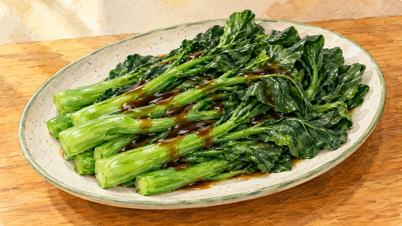 Illustration of cooked gai lan with thick green stems and leafy tops, drizzled with oyster sauce on an oval platter.