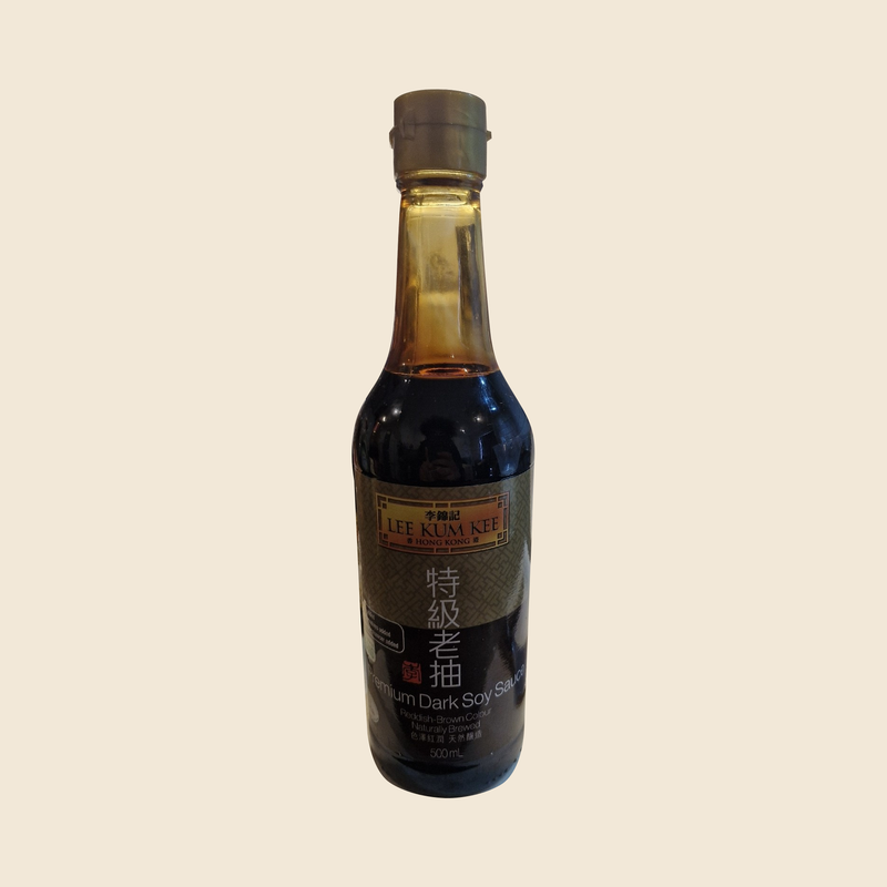 Complete Lee Kum Kee Premium Dark Soy Sauce 500 mL UK bottle on beige